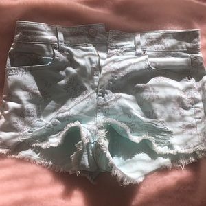 Adorable ripped teal shorts with gray pineapples!!